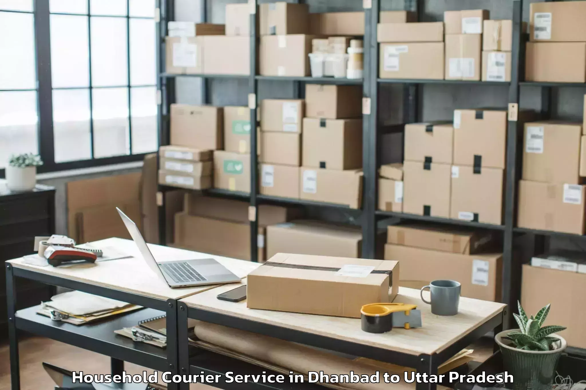 Top Dhanbad to Mauranwan Household Courier Available